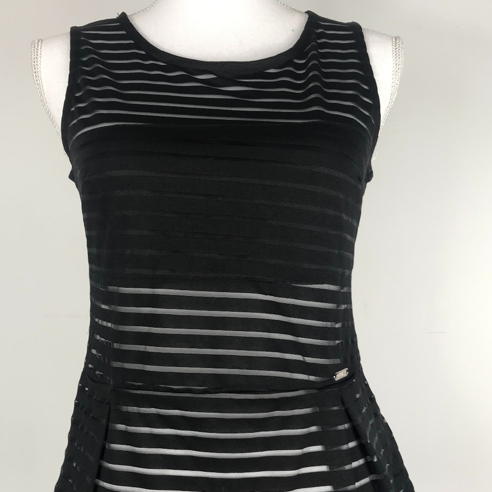 Guess illusion peplum $20 new!!